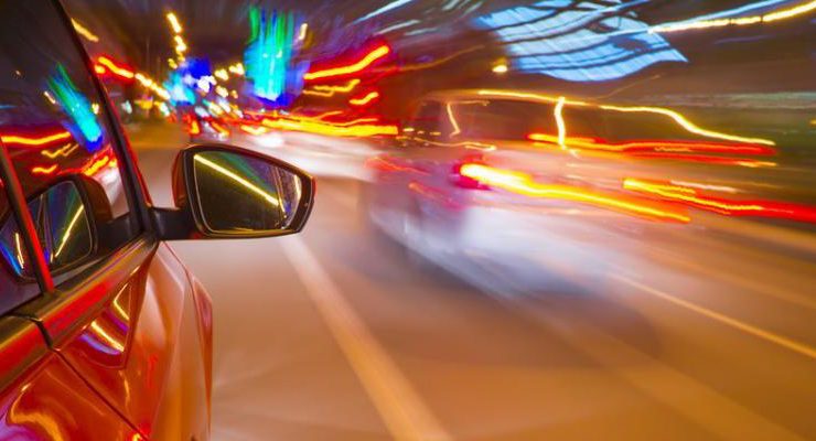 Cars on a highway going fast