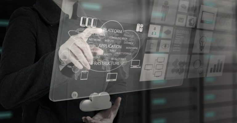 Man with hand on interactive board