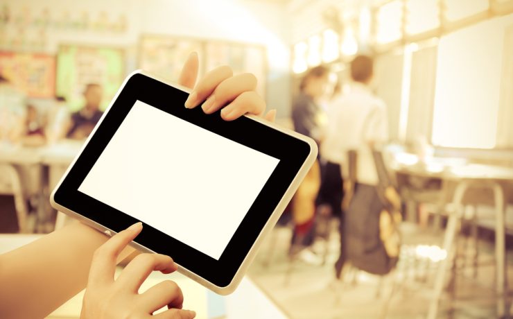 Employee holding a tablet