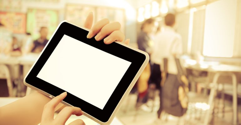 Employee holding a tablet