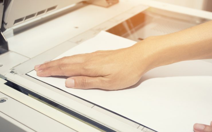 woman hands on paper, scanning