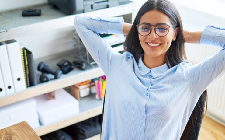 girl leaning back in a chair