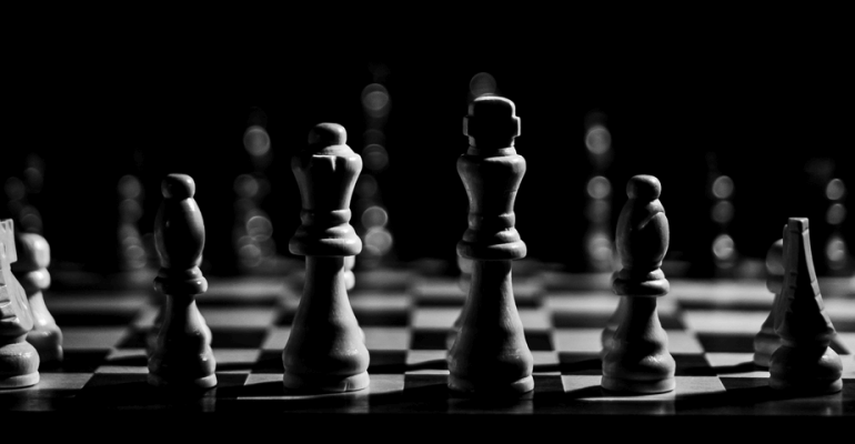 Black and white photo of a chess game