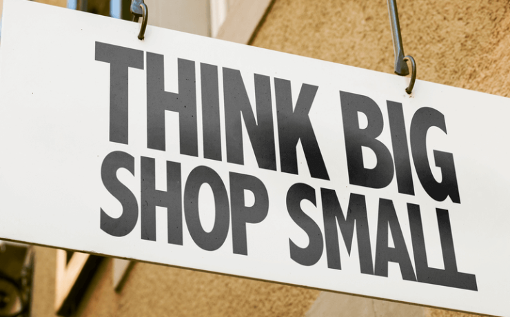 Think Big Shop Small sign in a conceptual image