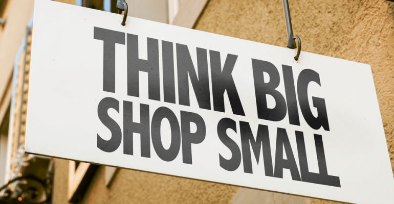 Think Big Shop Small sign in a conceptual image