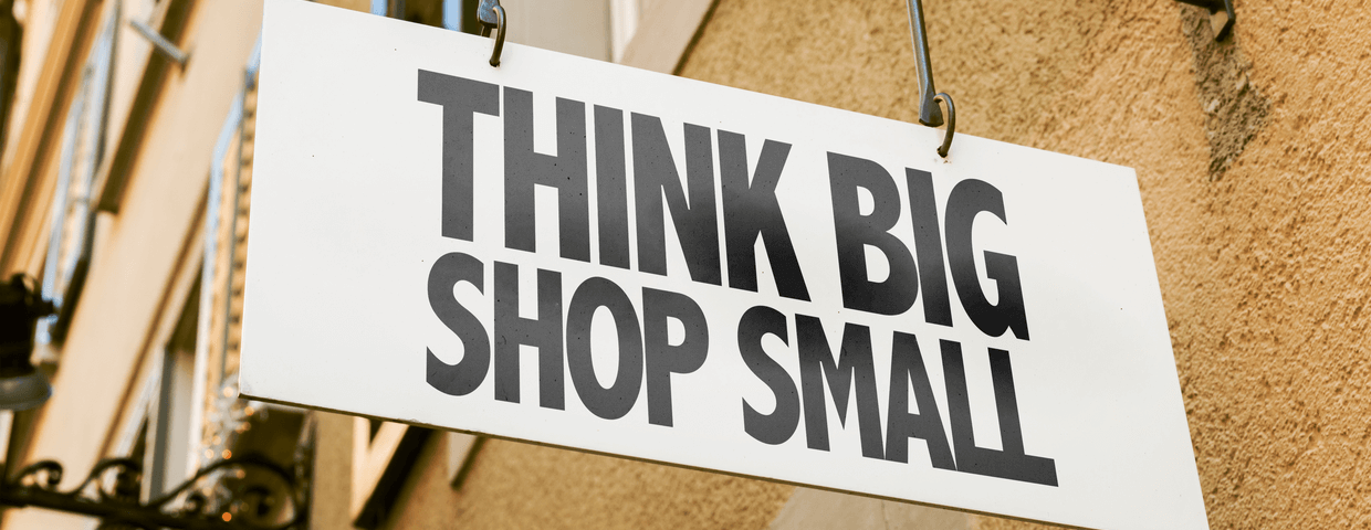 http://Think%20Big%20Shop%20Small%20sign%20in%20a%20conceptual%20image