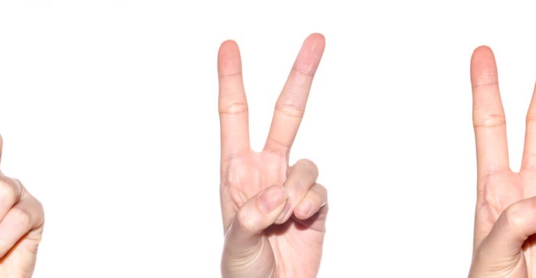Hands holding up one, two, and three fingers