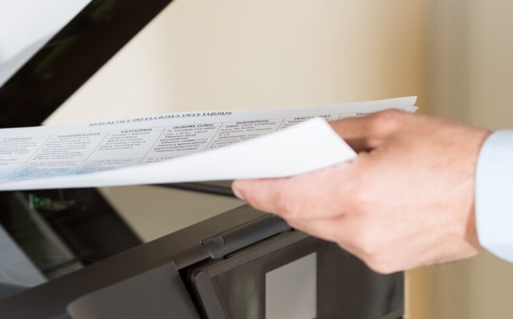 Business man scanning documents