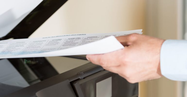 Business man scanning documents