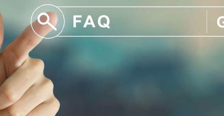 Person's finger touching the search icon on a virtual display