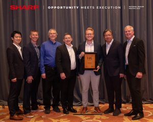 Sharp awards Team members of MMIT Business Solutions Group receiving an award