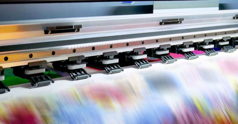 Close up of project being created on large inkjet printer