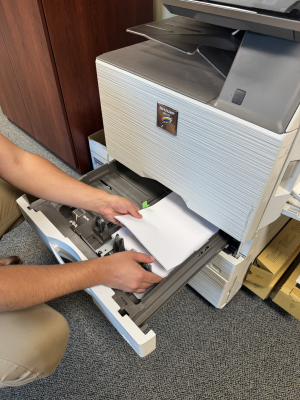 Device Service Service tech fixing copier